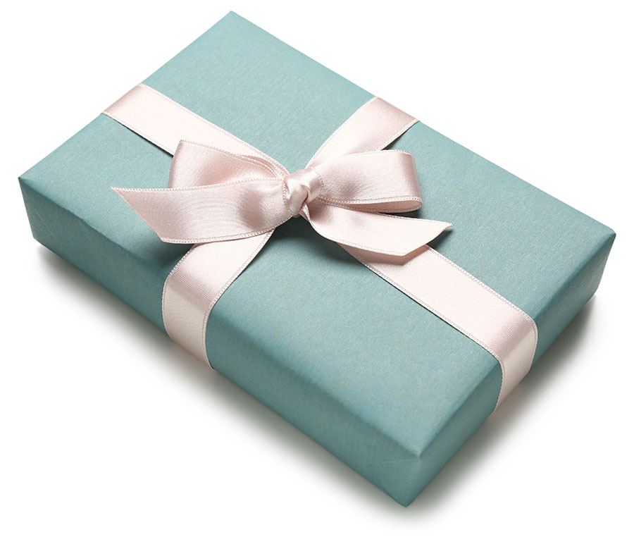 En present med presentkort på trädgårdsskötsel